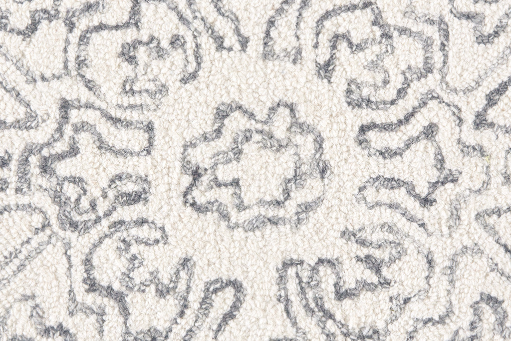 Ivory And Brown Wool Floral Tufted Handmade Stain Resistant Area Rug - 5' x 8'