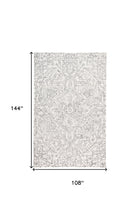 Ivory And Brown Wool Floral Tufted Handmade Stain Resistant Area Rug - 5' x 8'