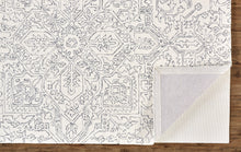 Ivory And Brown Wool Floral Tufted Handmade Stain Resistant Area Rug - 5' x 8'