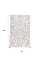 Ivory And Brown Wool Floral Tufted Handmade Stain Resistant Area Rug - 5' x 8'