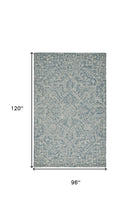 Ivory And Brown Wool Floral Tufted Handmade Stain Resistant Area Rug - 5' x 8'