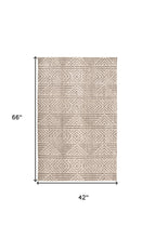 4' X 6' Tan Ivory And Brown Geometric Stain Resistant Area Rug