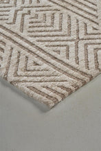 4' X 6' Tan Ivory And Brown Geometric Stain Resistant Area Rug