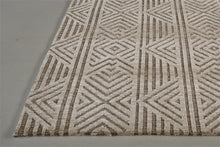 4' X 6' Tan Ivory And Brown Geometric Stain Resistant Area Rug