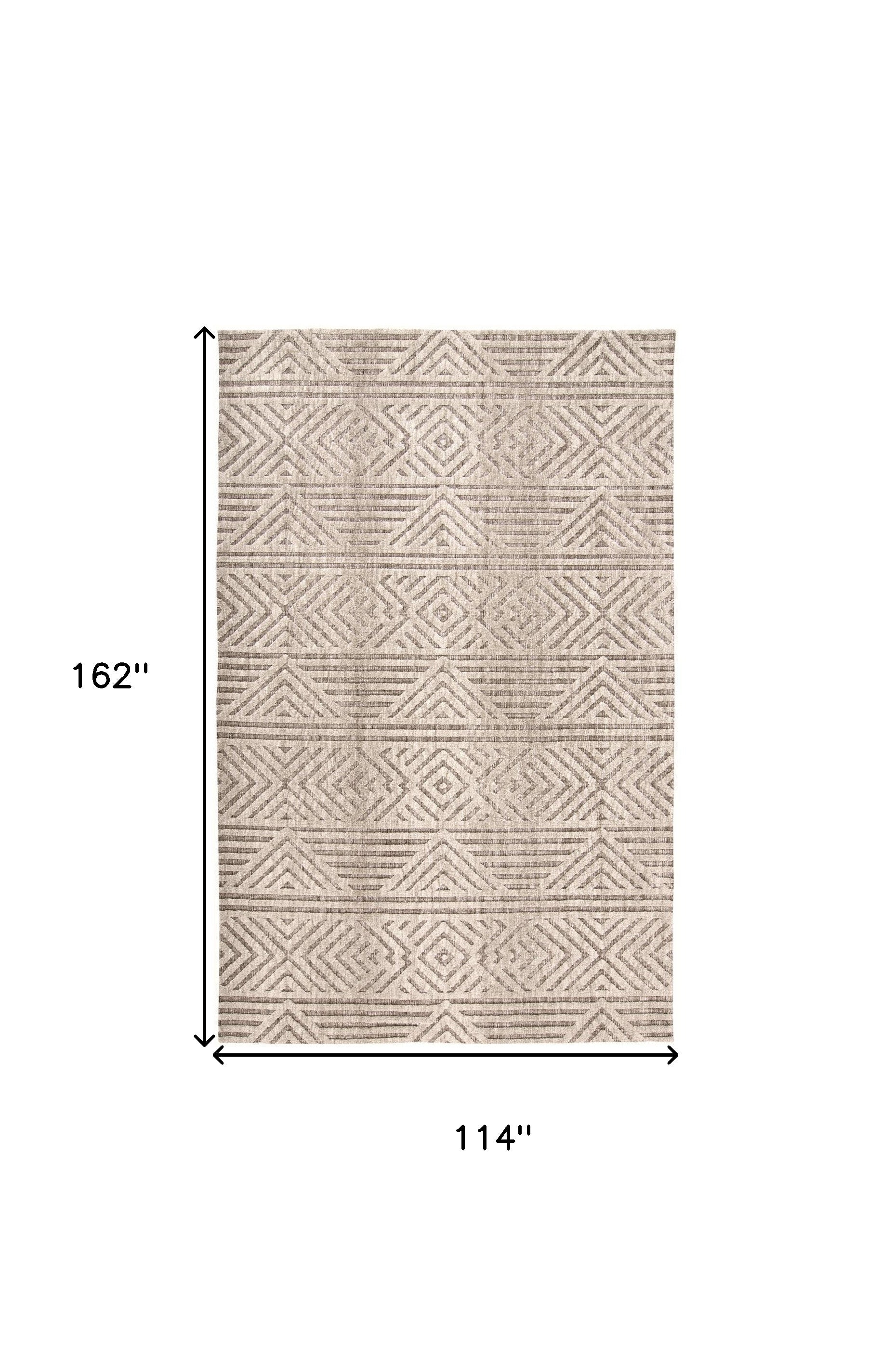 4' X 6' Tan Ivory And Brown Geometric Stain Resistant Area Rug