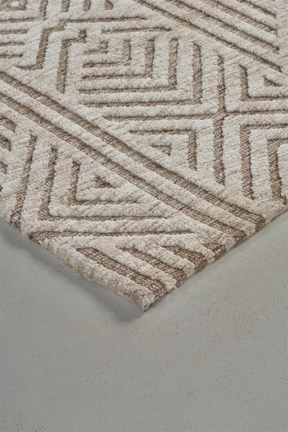 4' X 6' Tan Ivory And Brown Geometric Stain Resistant Area Rug