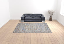 4' X 6' Taupe Blue And Gray Floral Stain Resistant Area Rug