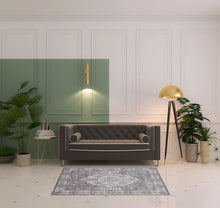 4' X 6' Gray Blue And Gold Floral Stain Resistant Area Rug