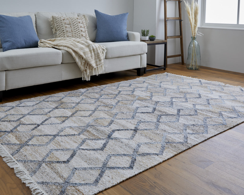 Gray Ivory And Tan Geometric Hand Woven Stain Resistant Area Rug With Fringe - 4' x 6'