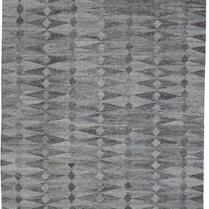 4' X 6' Gray Silver And Ivory Geometric Hand Woven Stain Resistant Area Rug With Fringe
