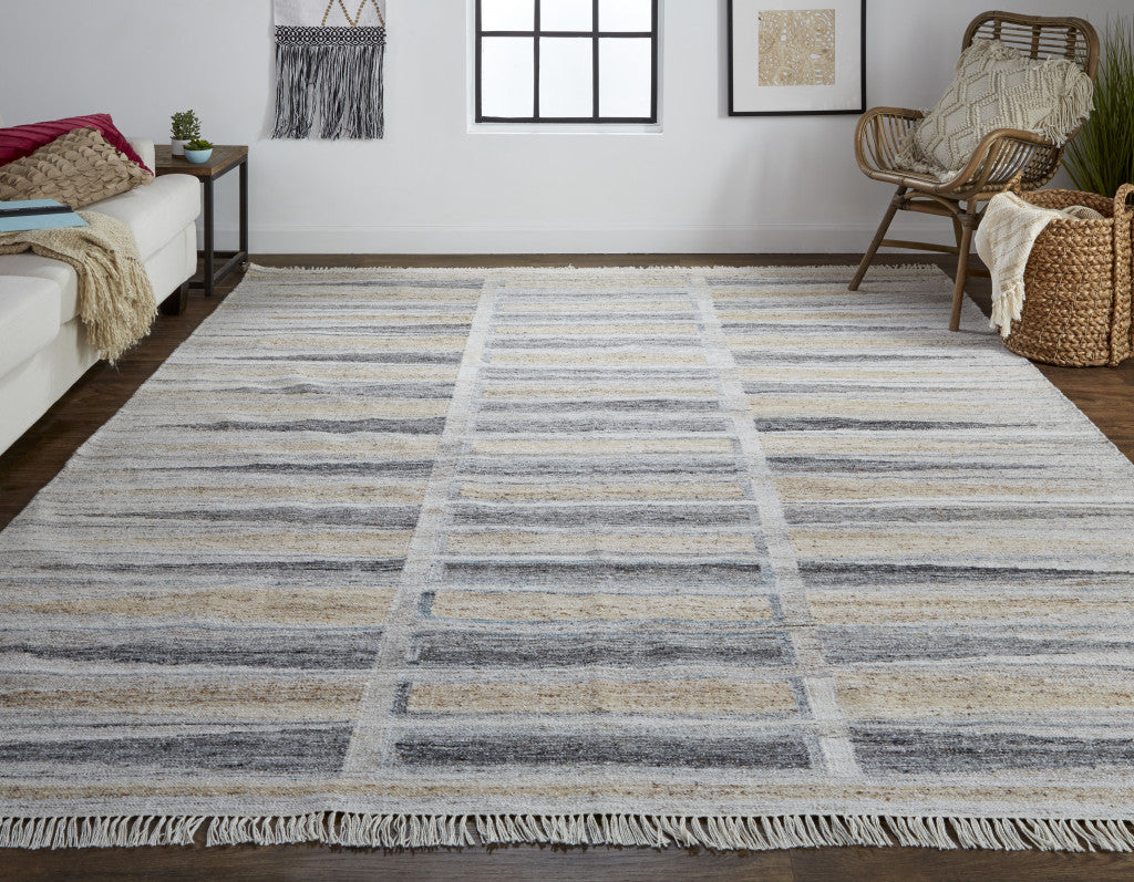 Tan Gray And Taupe Geometric Hand Woven Stain Resistant Area Rug With Fringe - 4' x 6'