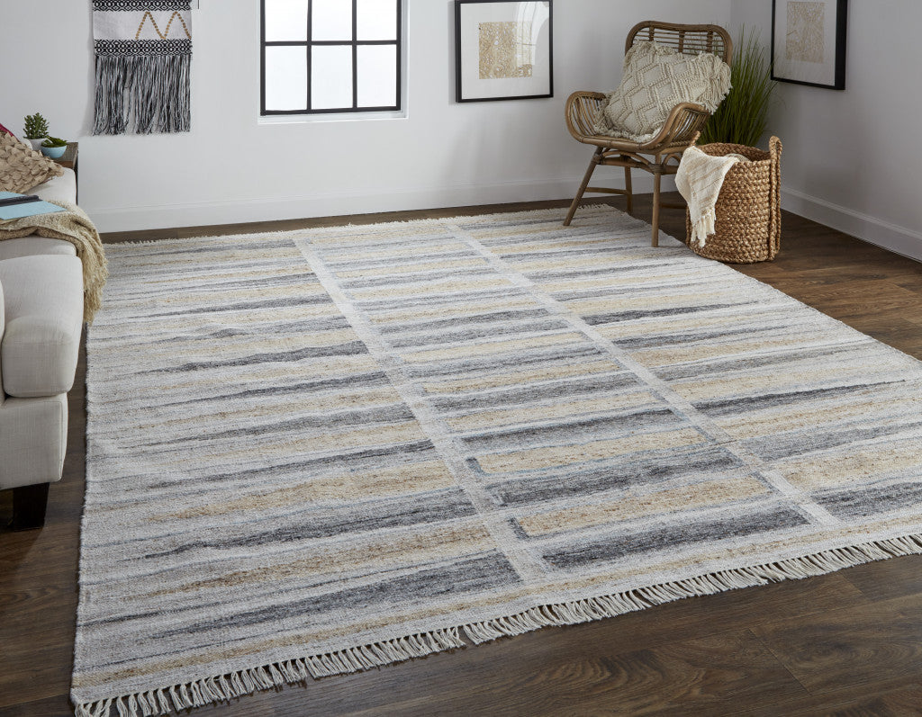 Tan Gray And Taupe Geometric Hand Woven Stain Resistant Area Rug With Fringe - 4' x 6'