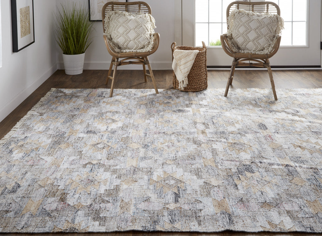 4' X 6' Taupe Gray And Blue Geometric Hand Woven Stain Resistant Area Rug With Fringe