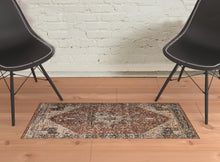 2' X 3' Red Ivory And Black Abstract Distressed Area Rug With Fringe