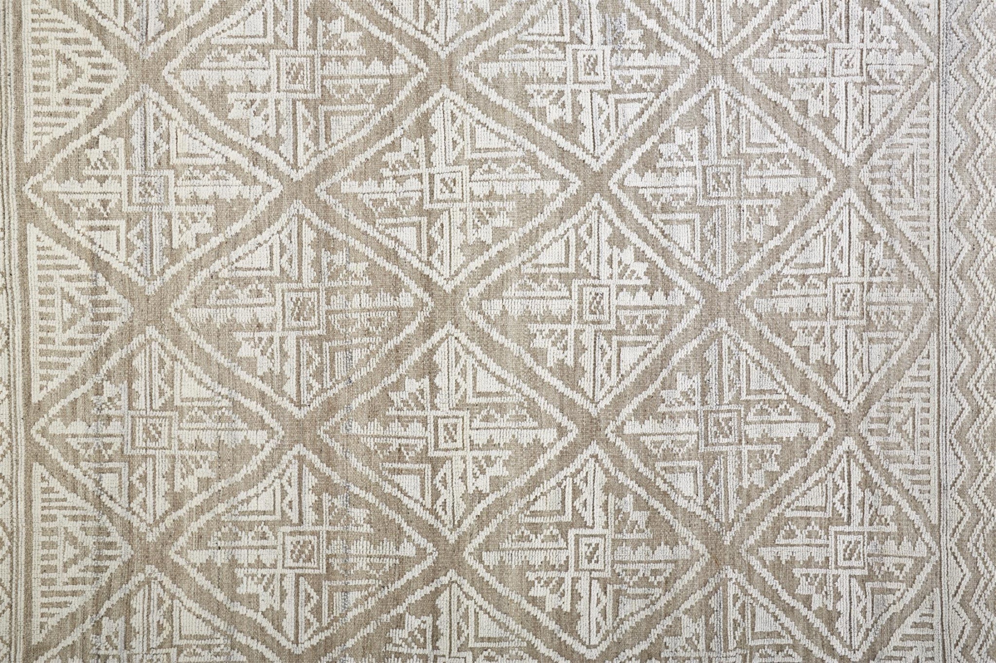 4' X 6' Ivory Tan And Gray Geometric Hand Knotted Area Rug