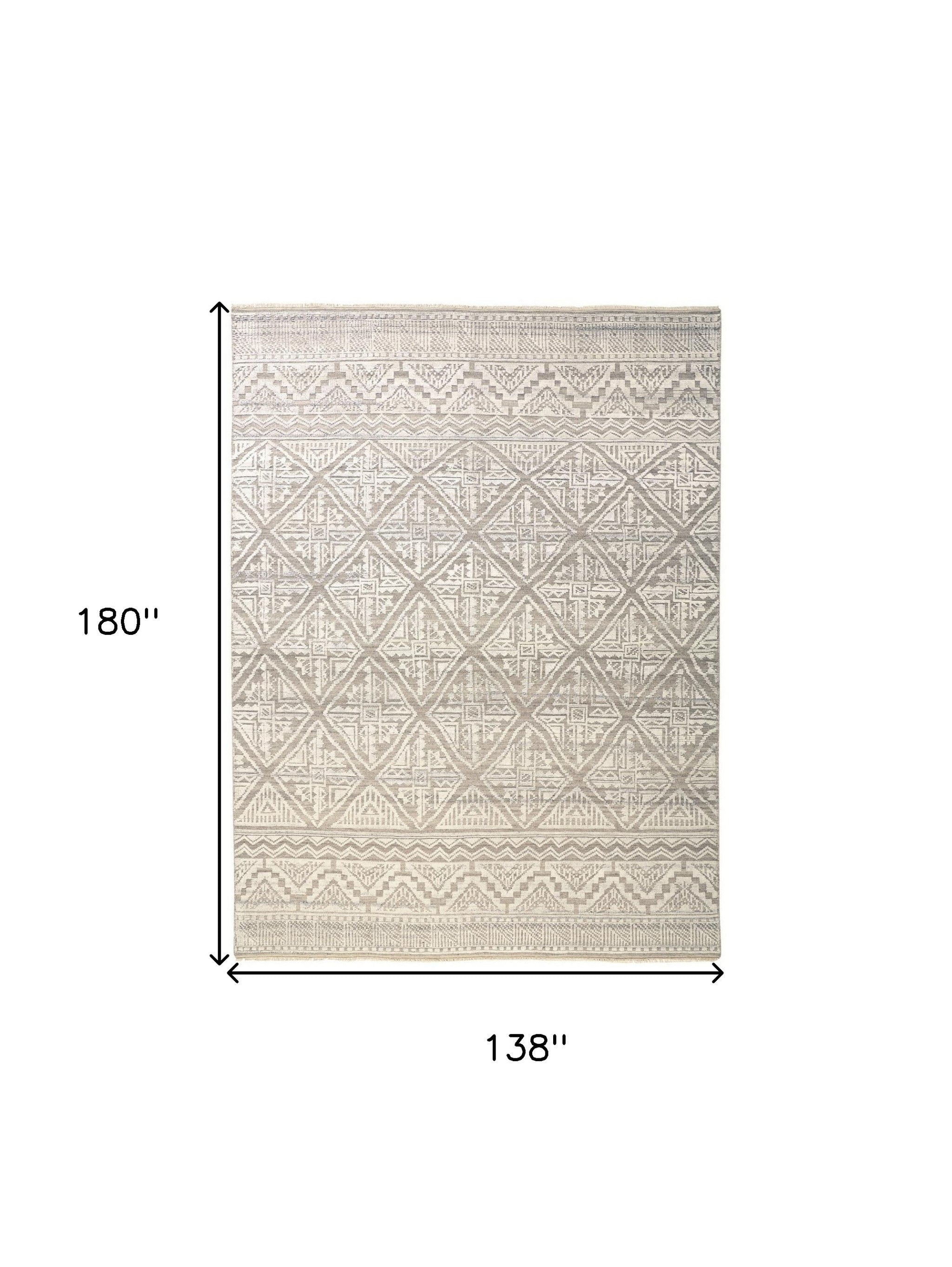 4' X 6' Ivory Tan And Gray Geometric Hand Knotted Area Rug