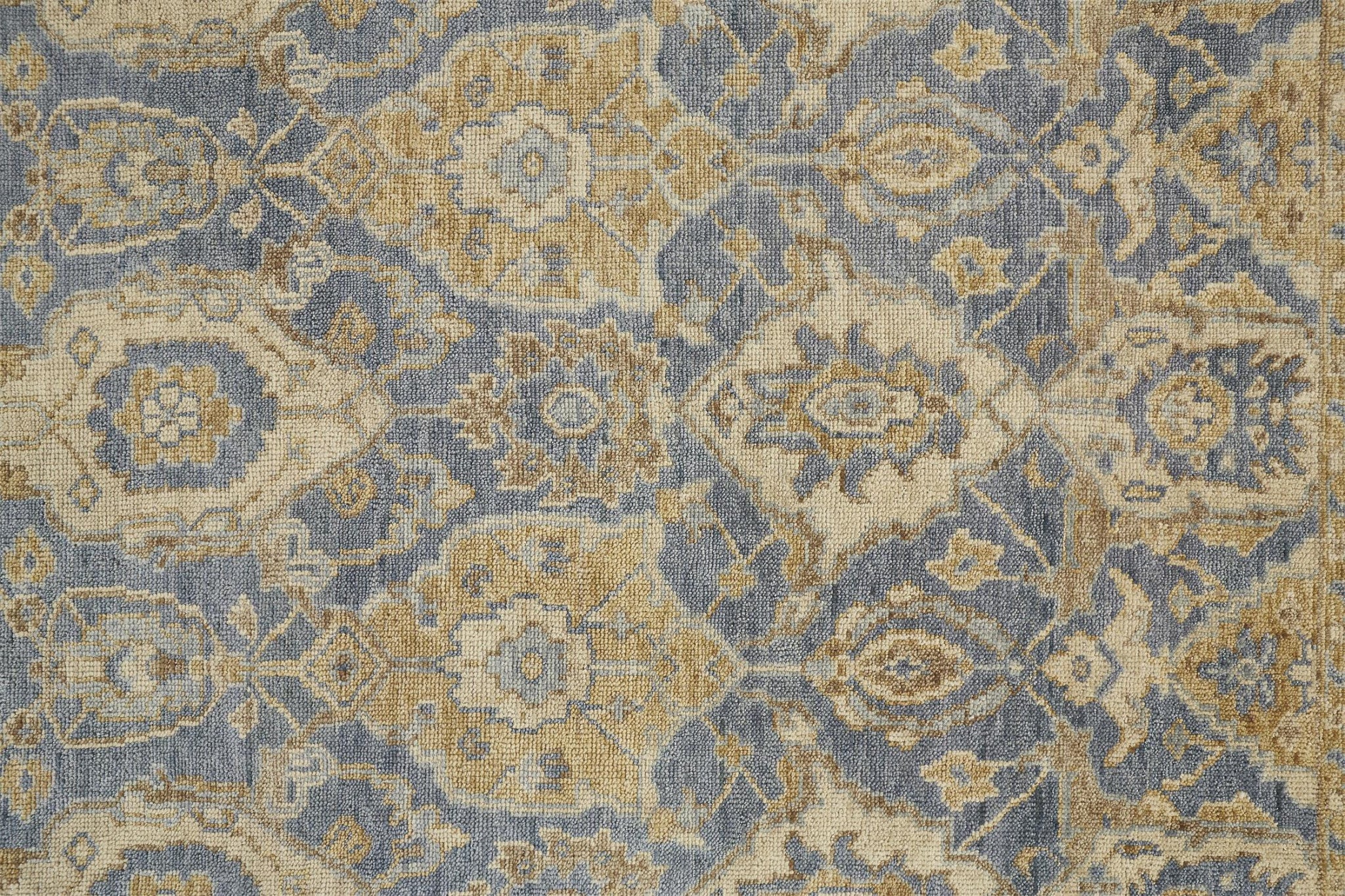 4' X 6' Blue Gold And Tan Wool Floral Hand Knotted Stain Resistant Area Rug With Fringe