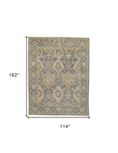 4' X 6' Blue Gold And Tan Wool Floral Hand Knotted Stain Resistant Area Rug With Fringe