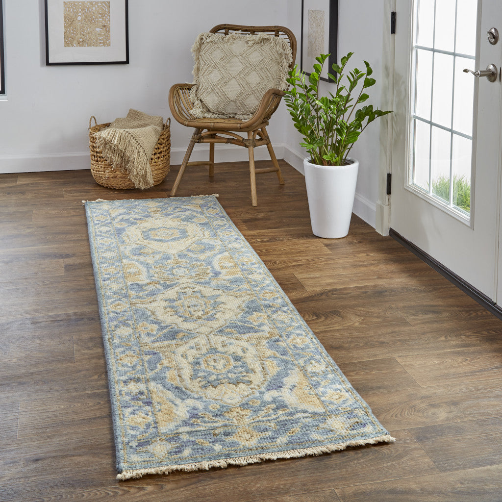 4' X 6' Blue Gold And Tan Wool Floral Hand Knotted Stain Resistant Area Rug With Fringe