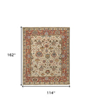 5' X 8' Ivory Red And Blue Wool Floral Hand Knotted Stain Resistant Area Rug
