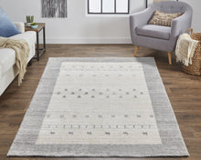 4' X 6' Ivory And Gray Wool Hand Knotted Stain Resistant Area Rug