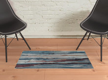 Red Pink And Blue Wool Abstract Tufted Handmade Stain Resistant Area Rug - 4' x 6'