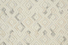 Gray And Ivory Wool Geometric Tufted Handmade Area Rug - 4' x 6'