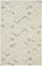 Gray And Ivory Wool Geometric Tufted Handmade Area Rug - 4' x 6'