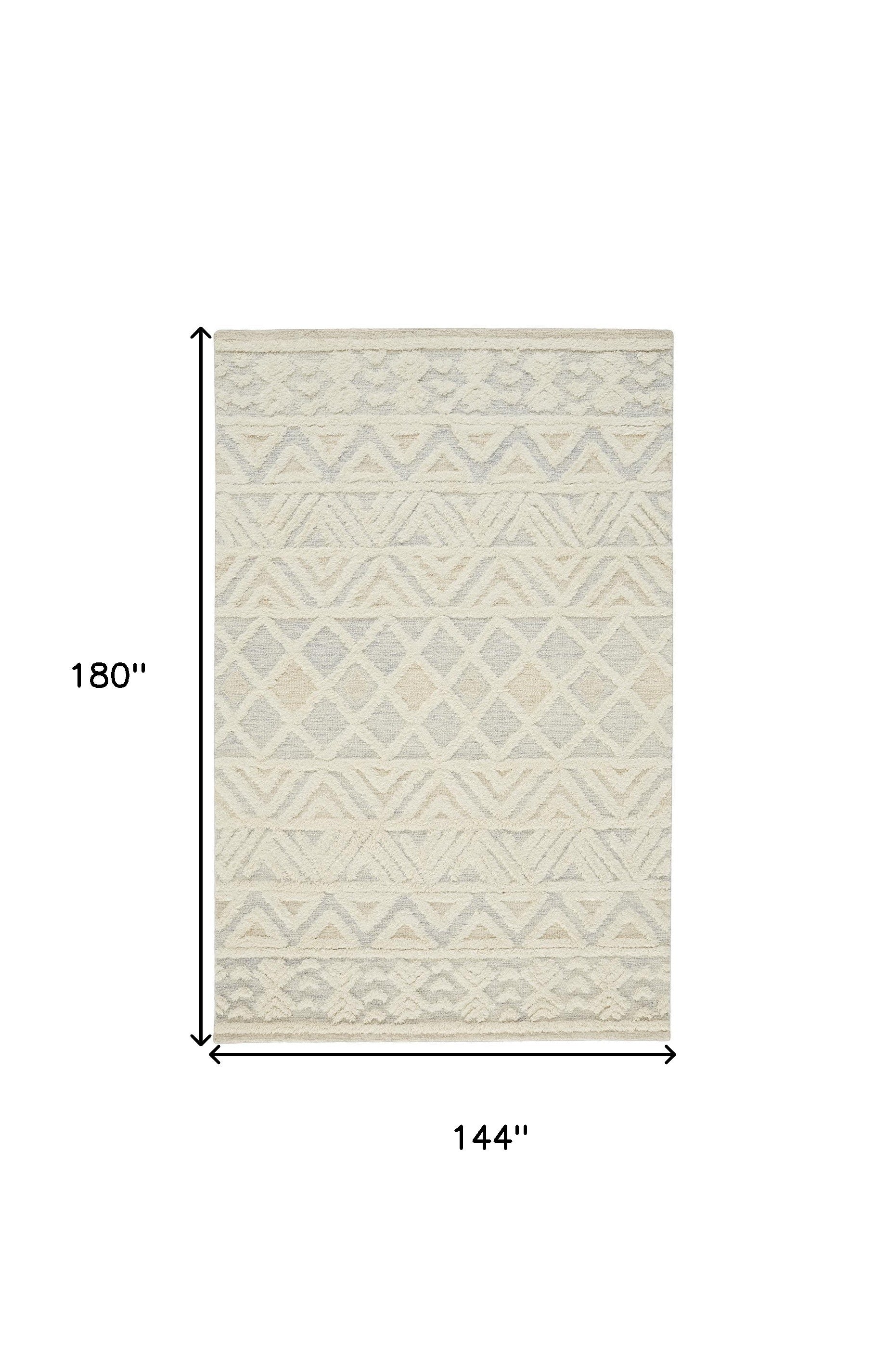Ivory Blue And Tan Wool Geometric Tufted Handmade Stain Resistant Area Rug - 4' x 6'