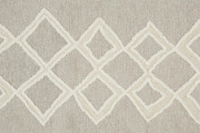 Gray And Ivory Wool Geometric Tufted Handmade Stain Resistant Area Rug - 4' X 6'