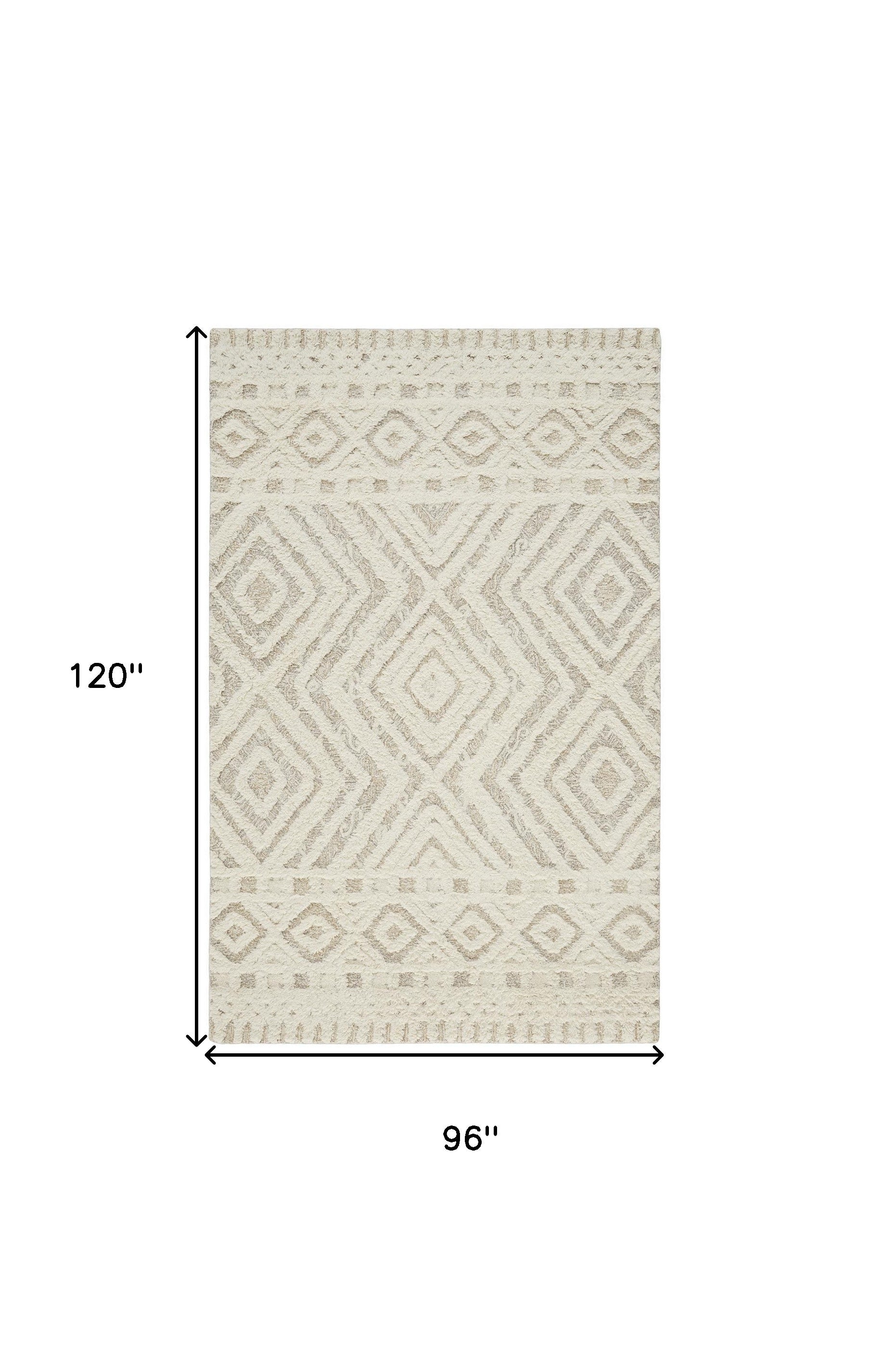 Ivory And Tan Wool Geometric Tufted Handmade Stain Resistant Area Rug - 4' x 6'