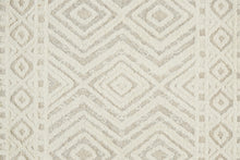 Ivory And Tan Wool Geometric Tufted Handmade Stain Resistant Area Rug - 4' x 6'