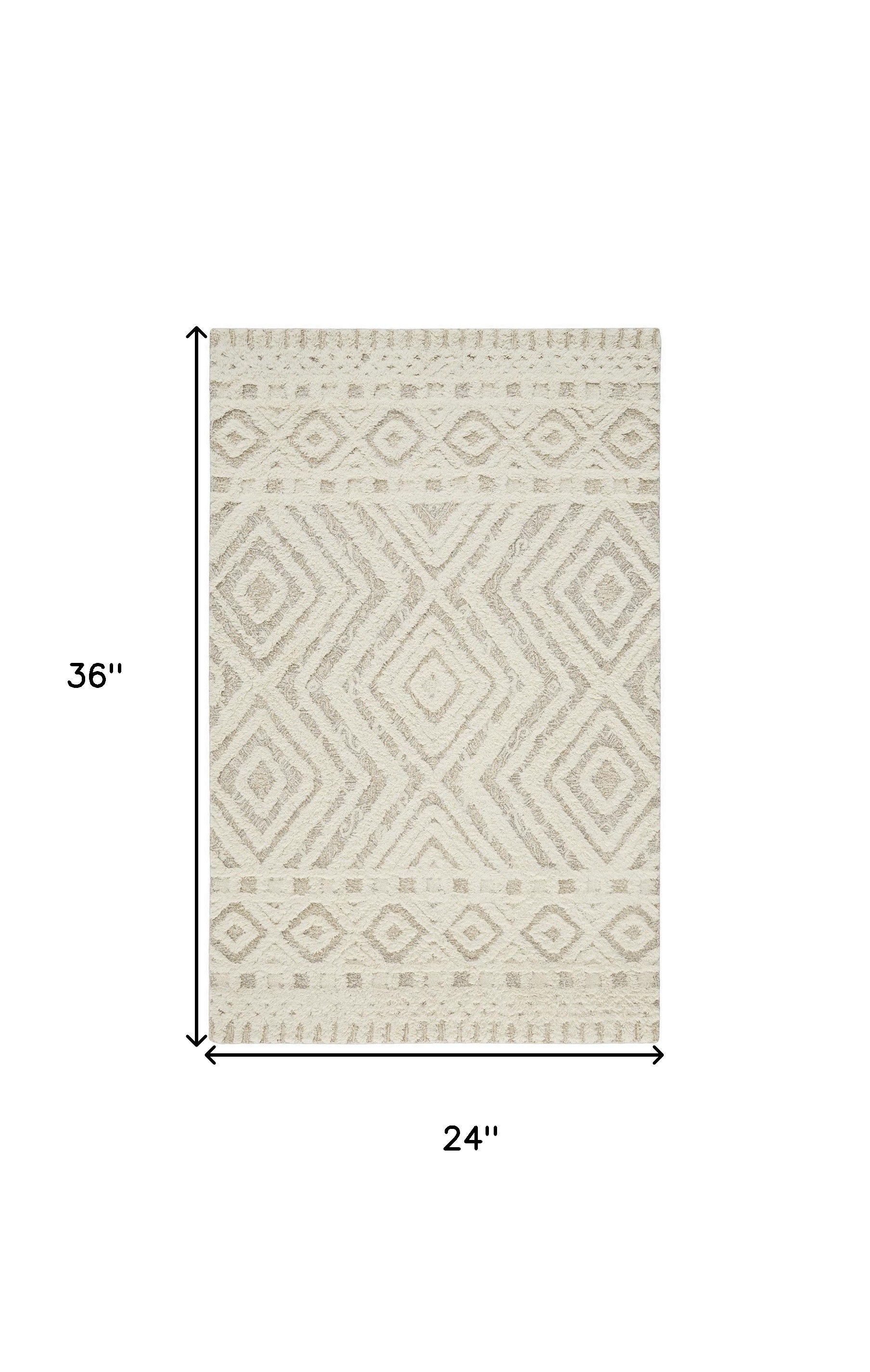 Ivory And Tan Wool Geometric Tufted Handmade Stain Resistant Area Rug - 4' x 6'