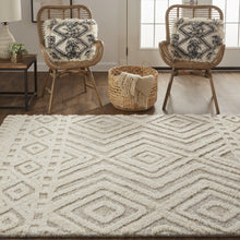 Ivory And Tan Wool Geometric Tufted Handmade Stain Resistant Area Rug - 4' x 6'