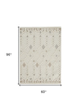 Ivory Tan And Silver Wool Geometric Tufted Handmade Stain Resistant Area Rug - 4' x 6'