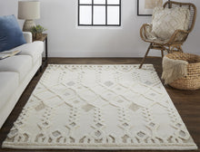 Ivory Tan And Silver Wool Geometric Tufted Handmade Stain Resistant Area Rug - 4' x 6'
