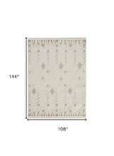 Ivory Tan And Silver Wool Geometric Tufted Handmade Stain Resistant Area Rug - 4' x 6'