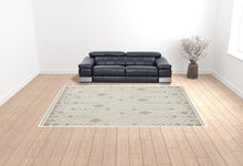 Ivory Tan And Silver Wool Geometric Tufted Handmade Stain Resistant Area Rug - 4' x 6'