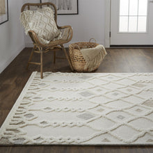 Ivory Tan And Silver Wool Geometric Tufted Handmade Stain Resistant Area Rug - 4' x 6'