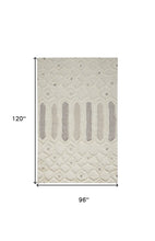 Ivory Taupe And Tan Wool Geometric Tufted Handmade Stain Resistant Area Rug - 4' x 6'