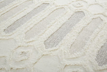 Ivory Taupe And Tan Wool Geometric Tufted Handmade Stain Resistant Area Rug - 4' x 6'