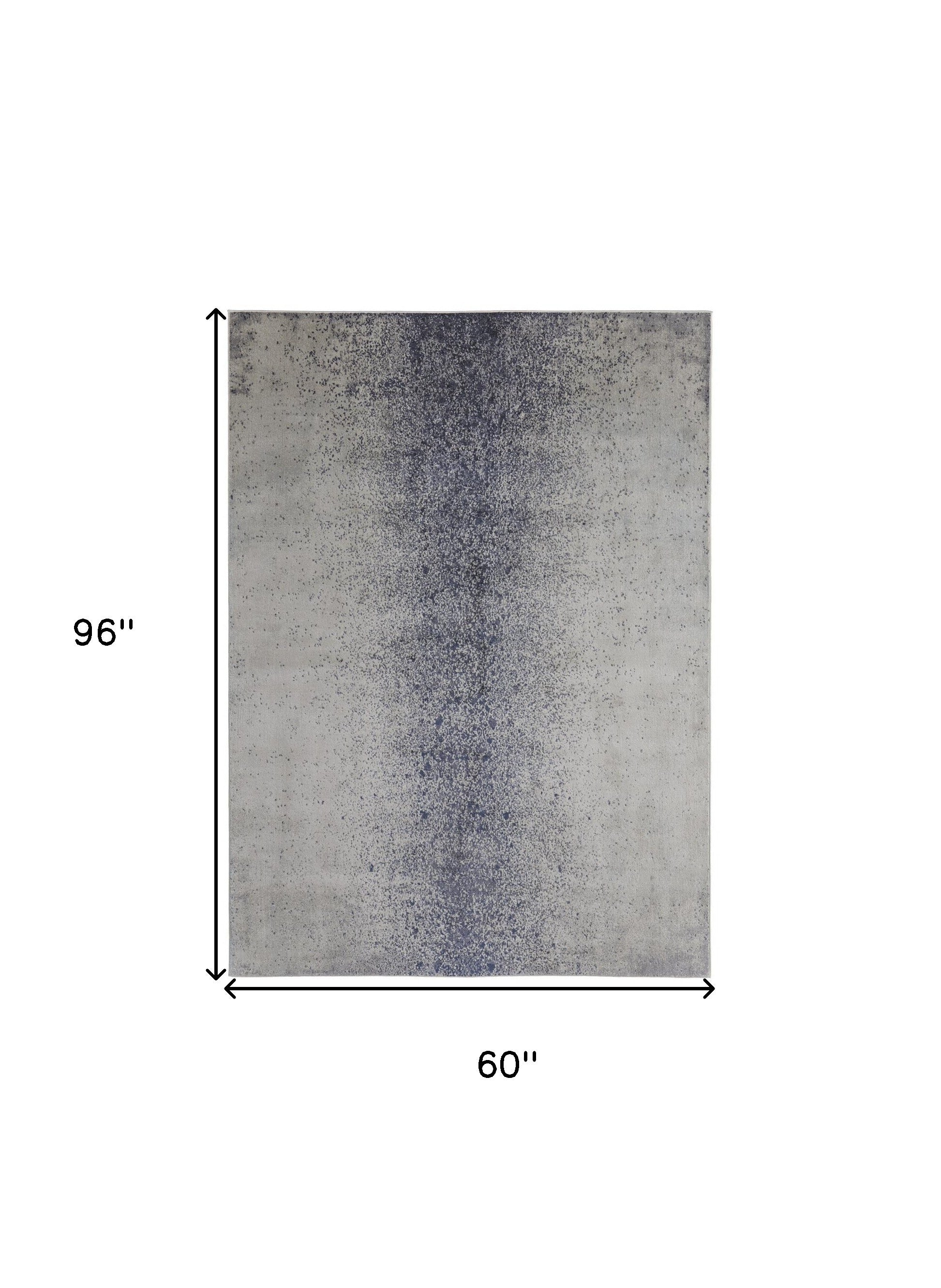 4' X 6' Ivory And Blue Abstract Power Loom Area Rug