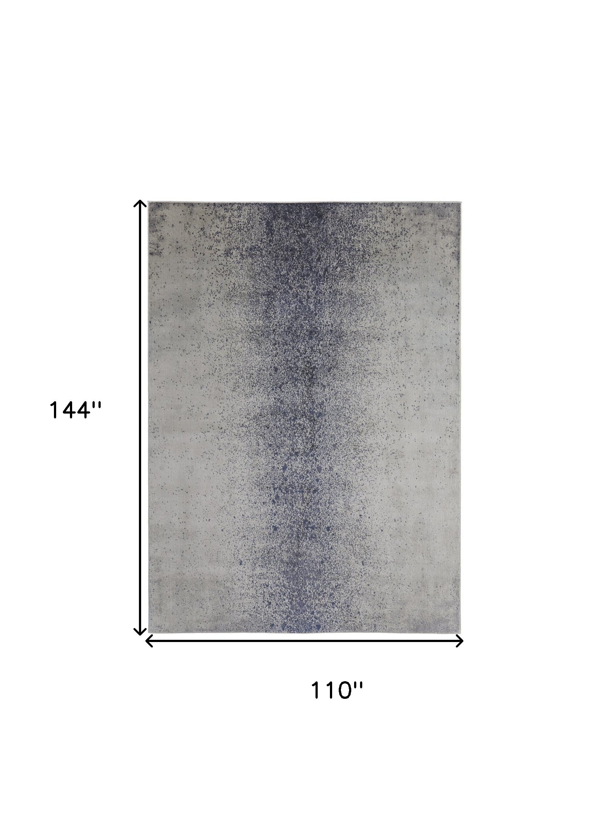 4' X 6' Ivory And Blue Abstract Power Loom Area Rug