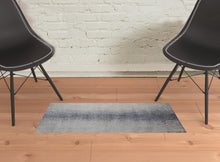4' X 6' Ivory And Blue Abstract Power Loom Area Rug
