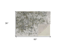 3' X 5' Green Gray And Ivory Abstract Distressed Stain Resistant Area Rug