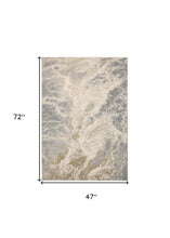4' X 6' Ivory Silver And Gold Abstract Area Rug