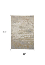 Ivory Gold And Gray Abstract Area Rug - 4' x 6'