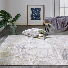 Ivory Gold And Gray Abstract Area Rug - 4' x 6'