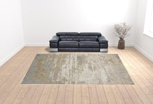 Ivory Gold And Gray Abstract Area Rug - 4' x 6'