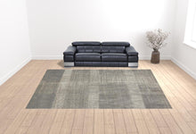 4' X 6' Gray And Ivory Abstract Area Rug